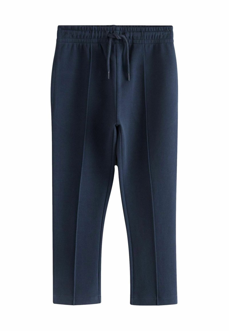 Pantalon décontracté bleu marine avec taille élastique et cordon à l'avant, jambes droites et coutures avant visibles.
