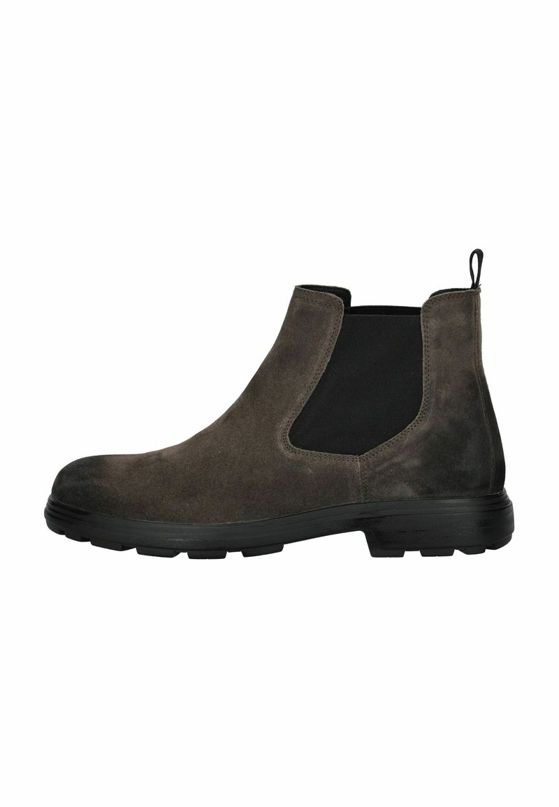 Botines de ante marrón con un panel lateral de elastano negro, suela de goma plana y una pestaña en la parte trasera para ponérselos fácilmente.