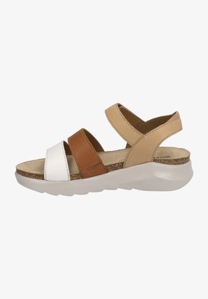 Slide sandal featuring three wide straps in white, brown, and tan leather. Cork footbed on a translucent rubber sole for comfort and support.