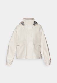 Veste crème légère et imperméable avec un col montant, une capuche et deux grandes poches avant. Comprend des accents réfléchissants et des poignets élastiques.