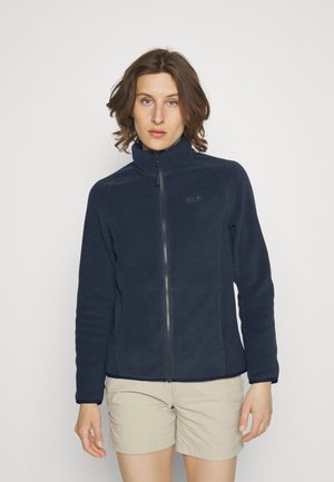 Navy fleece jacket with high collar and front zipper. Featuring a smooth texture and subtle branding on the chest.