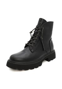 Stivale alla caviglia in pelle nera con punta rotonda, caratterizzato da un accento di glitter testurizzati sulla parte superiore e suola in gomma nera robusta con scanalature.