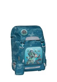 Sac à dos camouflage teal avec un graphique sur le devant représentant un personnage en cubes, des poches zippées et un patch circulaire en haut.
