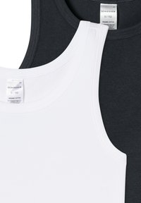 Two cotton tank tops: one white and one dark gray. Features round necklines and soft texture. Labels visible on the inside, indicating sizes.