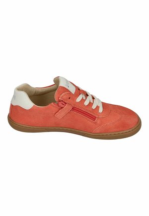 Coral suede low-top sneaker with white laces, side zipper, white heel tab, cushioned interior, and brown rubber sole.