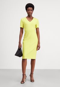 BOSS DAMAISA - Žerzejové šaty - medium yellow
