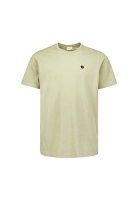 Beige T-shirt met korte mouwen en ronde hals, met een klein donker zeshoekig logo op de linkerborst, weergegeven op een witte achtergrond.