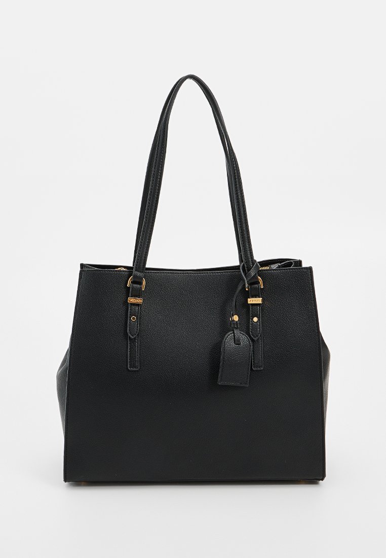 Svart läder tote-väska med guld accenter, strukturerad form, två långa handtag och en avtagbar tag. Texturerad utsida med en slät finish.