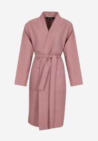 Robe rosa a maglia waffle con maniche lunghe, cintura con cravatta e due tasche frontali. Tessuto morbido con vestibilità rilassata.