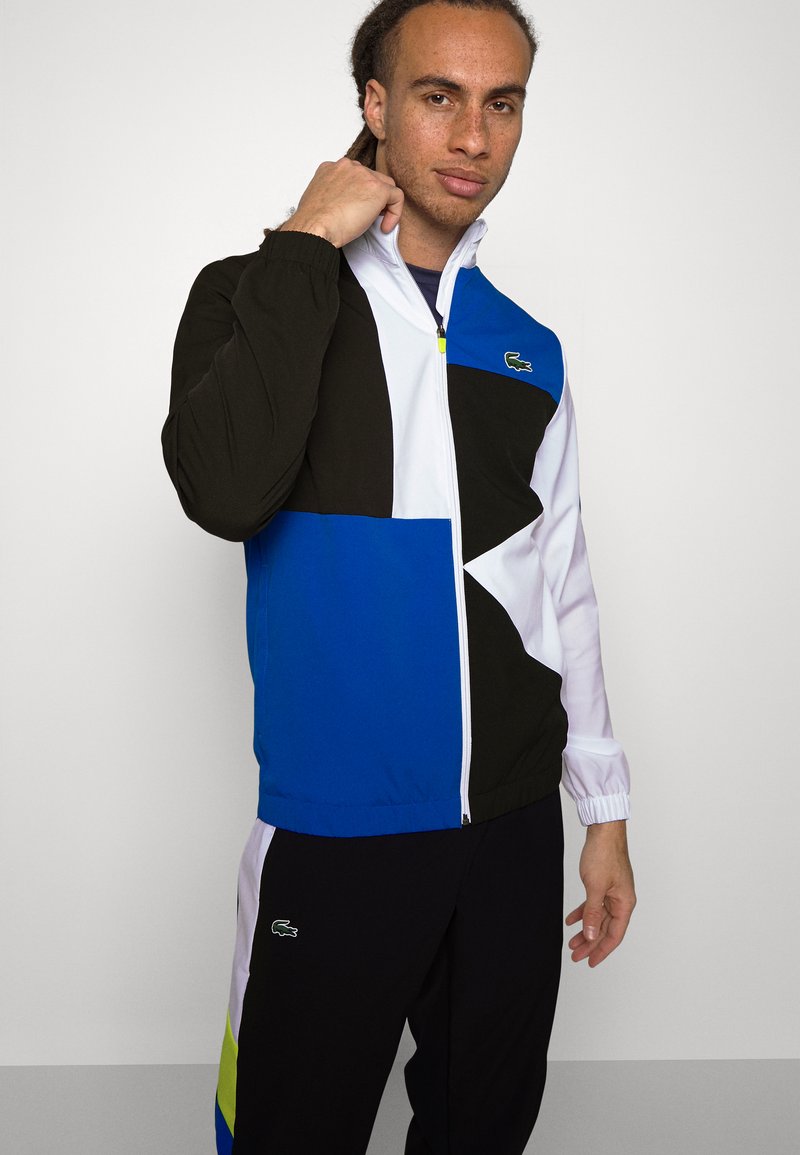 lacoste tracksuit blue