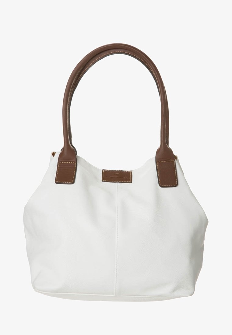 Bílá kožená taška s hnědými ušima z umělé kůže. Zakřivený tvar, minimalistický design a viditelné švy na uchách.