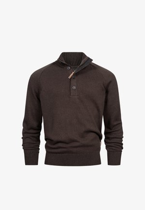 Mørkebrunt strikket genser med høy krage, placket med tre knapper og ribbet mansjetter og nederkant. Har en sideetikett detalj.