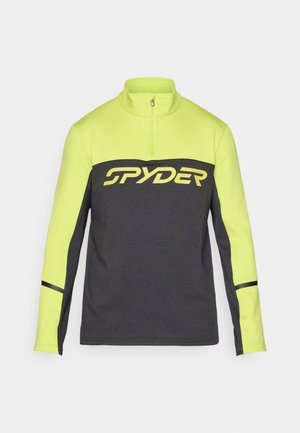 Polar w kolorze czarnym i neonowym żółtym, z logo "SPYDER" na piersi, długimi rękawami i kontrastującymi panelami bocznymi.