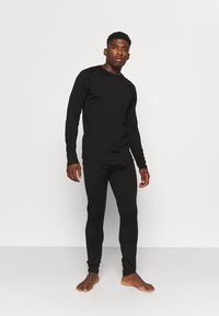 Rukka TIILAJA - Pitkät alushousut - black