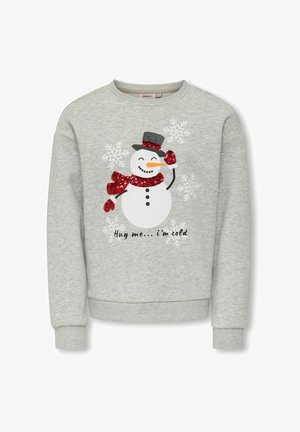 Grå sweatshirt med en snemandsgrafik med et rødt paliethalstørklæde og vanter, sort hat og hvide snefnug. Teksten lyder: "Kram mig... Jeg fryser."