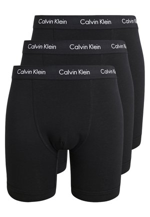 Zwarte katoenen boxershorts in een verpakking van drie, met een zachte elastische tailleband met het witte "Calvin Klein" logo. Glad materiaal en een aansluitend ontwerp.