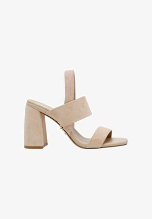 Sandalo con tacco alto in suede beige, con due ampie cinghie e punta aperta. Presenta un tacco a blocco e una cinghia posteriore regolabile per un migliore supporto.