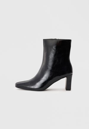 High heeled ankle boots - black