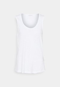 Balta liemenėlė, pagaminta iš minkštos, lengvos medžiagos. Turi apvalų iškirpimą, platų armhole ir laisvą siluetą su tiesiu apdaila.