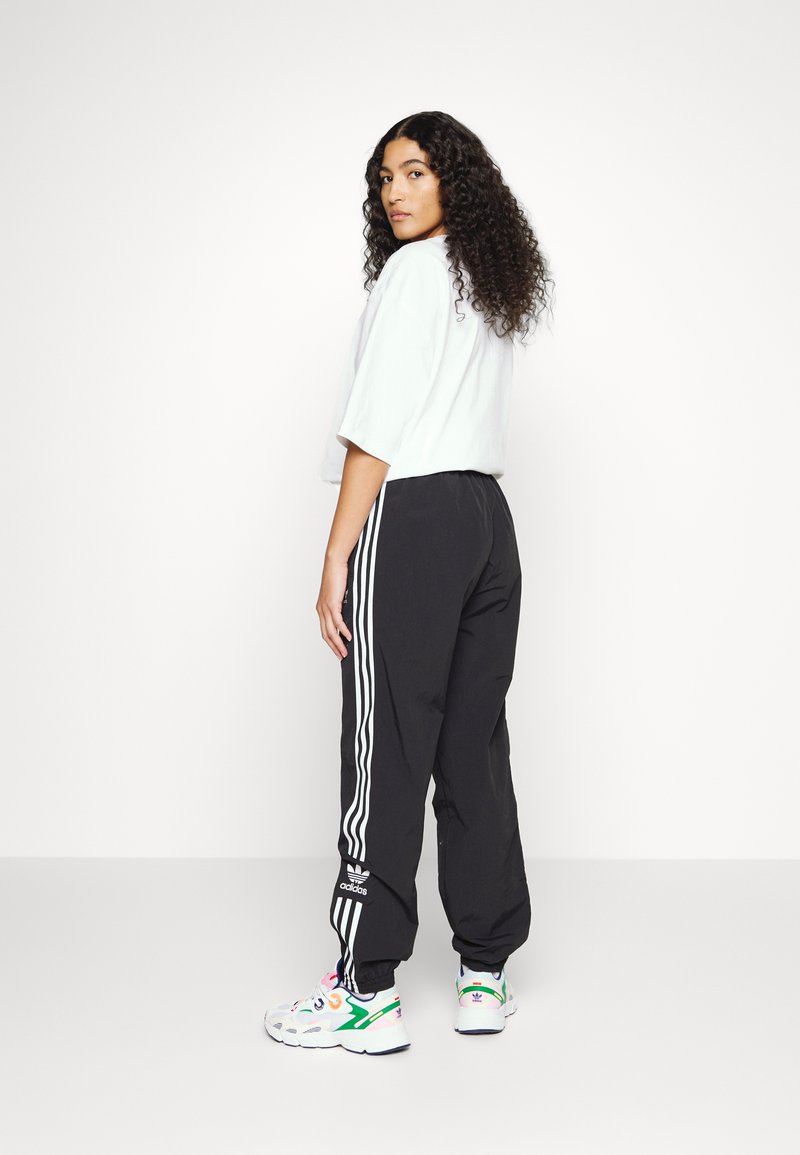 adidas Originals CLASSICS LOCK UP TRACK PANTS - Jogginghose - black/schwarz