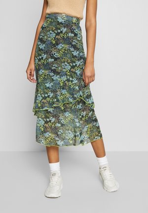Falda midi floral con un diseño en capas en azul, verde y amarillo. Confeccionada en una tela ligera con un dobladillo con volantes y una cintura elástica.