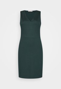 Vestido verde escuro, sem mangas, com decote em V e bordas onduladas. Feito de um tecido liso e elástico. Silhueta ajustada com um design até ao joelho.