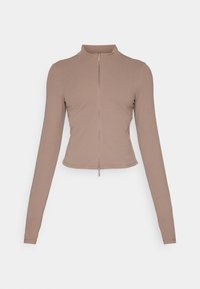 Zip-up long-sleeve top in light brown, made of soft fabric. Features a high collar and slim fit with a straight hem.