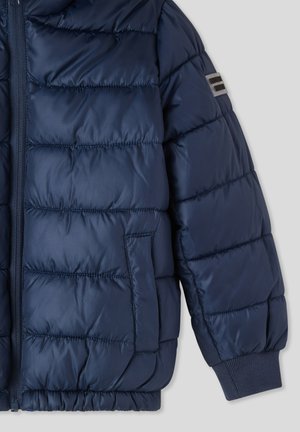Giacca puffer blu navy in nylon lucido, con zip frontale, tasche laterali, polsini a coste e cuciture a righe orizzontali.