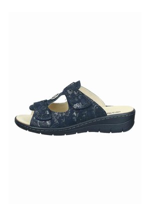 Navy blue open-toe women's sandal with adjustable straps, floral patterns, cushioned beige insole, and black wedge sole.