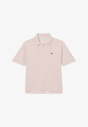 Light pink polo shirt made of cotton with a ribbed collar, two-button placket, short sleeves, and a green Lacoste logo on the chest.