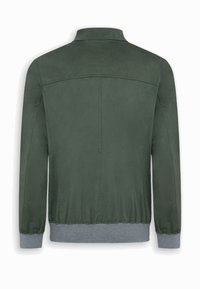 Veste vert foncé à manches longues, avec poignets et ceinture élastiques gris, vue de dos.