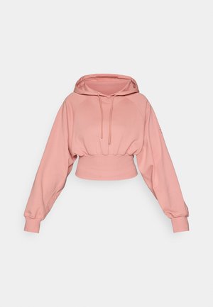 Różowy skrócony hoodie z kapturem ze sznurkiem, żebrowanym pasem w talii i balonowymi rękawami. Wykonany z miękkiego, strukturalnego materiału. Bez widocznych wzorów ani akcentów.