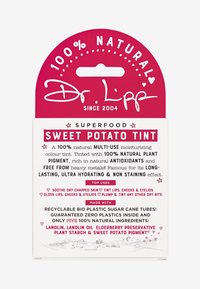 Dr. Lipp Sweet Potato Tint packaging, features bright pink upper section with white text, recyclable materials, and colorful product highlights.
