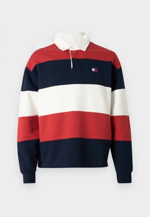 Polo shirt in red, navy, and white stripes; long sleeves; ribbed cuffs; soft cotton material; features small logo on chest.