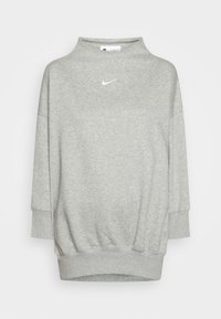 Grå sweatshirt med hög krage, neddragna axlar och ribbade ärmslut. Har en liten vit Nike-logotyp på bröstet. Mjukt material.