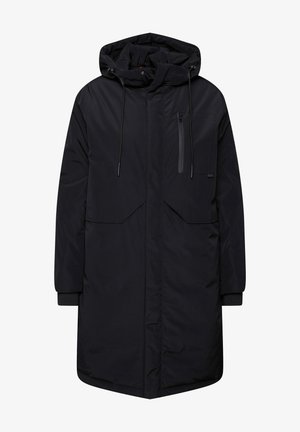 Le manteau parka noir présente une capuche, une poche poitrine zippée, de grandes poches avant, des poignets élastiqués et une coupe droite pour apporter de la chaleur.