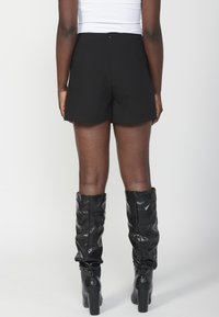 Koroshi Fustă mini - black