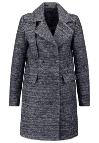 Cappotto da donna a maniche lunghe, doppiopetto, in tessuto texturizzato grigio scuro con ampi risvolti e due tasche frontali a pattina.