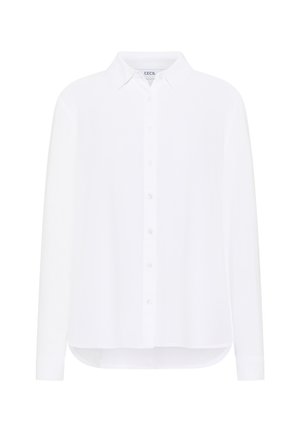 Chemise blanche à manches longues avec un col boutonné, patte de boutonnage sur le devant et ourlet incurvé. Fabriquée en tissu doux. Pas de motifs ni d'accents.