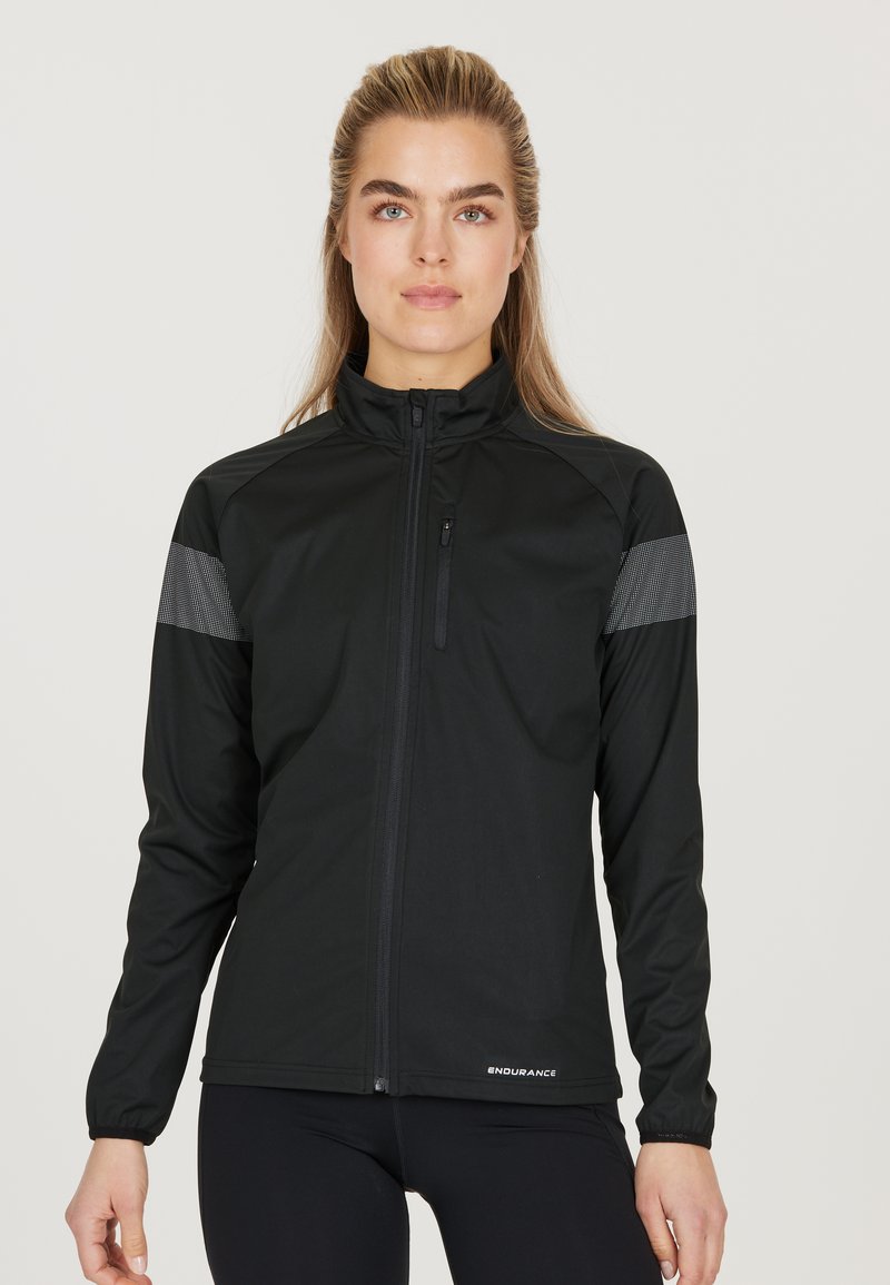Schwarze Sportjacke mit Volllänge-Reißverschluss, hohem Kragen und strukturierten grauen Akzenten an den Schultern. Leichtes, eng anliegendes Design mit elastischen Bündchen.