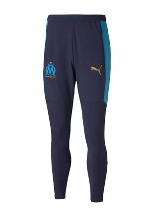 Marineblauwe sportbroeken met turquoise zijpanelen, gouden logo-accenten en een taps toelopende pasvorm, gemaakt van rekbaar materiaal voor comfort en bewegingsvrijheid.