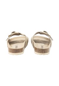 Sandalias beige con una planta de corcho, tiras traseras y una hebilla decorativa. Suela plana con un agarre texturizado. Diseño minimalista sin acentos adicionales.