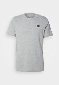 Šedé tričko s krátkým rukávem vyrobené z bavlny. Na levé straně hrudi má černé logo Nike. Kulatý výstřih. Měkká textilie.