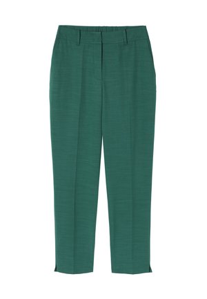 Pantalon tailleur vert au tissu lisse, doté de plis sur les côtés, d'une coupe droite et de petites fentes au bas des chevilles.