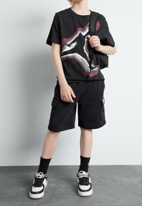 Jordan AIR HEATMAP JUMPMAN UNISEX - T-shirt med print - black