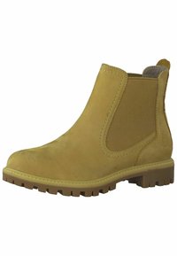 Tan suede ankle boots with elastic side panels, rugged rubber sole, and no visible hardware. Features a rounded toe and textured finish.