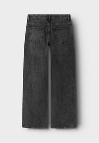 Jeans de pierna ancha en un lavado gris oscuro, confeccionados en denim. Incluyen dos bolsillos traseros y dobladillos terminados.
