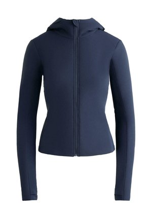 Veste ajustée bleu marine avec capuche, manches longues et fermeture éclair à l'avant. Tissu lisse et extensible sans coutures ni motifs visibles.