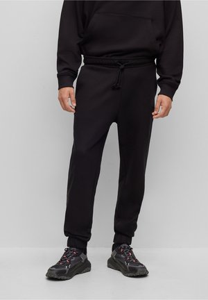 Pantalones deportivos - black