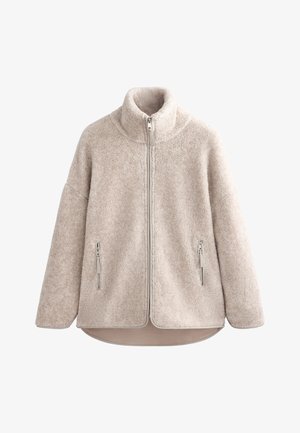 Beige Fleecejacke mit hohem Kragen, Frontreißverschluss und Seitentaschen. Besitzt eine weiche Textur und einen etwas längeren Hintersaum.
